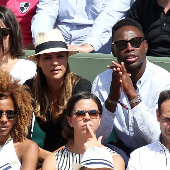Ariane Brodier et son compagnon Fulgence Ouedraogo - Les célébrités dans les tribunes lors des internationaux de France de Roland Garros à Paris, le 4 juin 2017. © Dominique Jacovides-Cyril Moreau/Bestimage