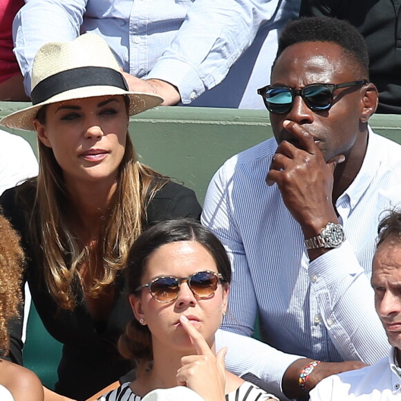 Ariane Brodier et son compagnon Fulgence Ouedraogo - Les célébrités dans les tribunes lors des internationaux de France de Roland Garros à Paris, le 4 juin 2017. © Dominique Jacovides-Cyril Moreau/Bestimage