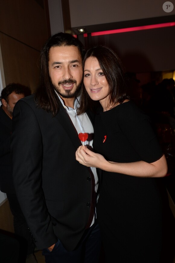 Moundir et sa femme Inès lors de l'édition 2014 de l'opération " Coiffeurs Contre le Sida "  à l'Académie L'Oréal Produits Professionnels à Paris, le 1er décembre 2014.