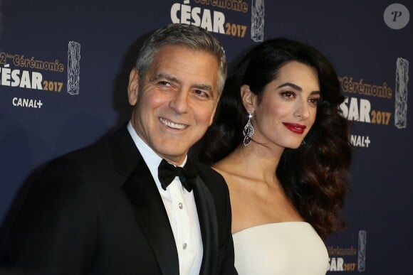 George Clooney et sa femme Amal Alamuddin-Clooney (enceinte) arrivant à la 42ème cérémonie des César à la Salle Pleyel à Paris le 24 février 2017. © Olivier Borde / Dominique Jacovides / Bestimage