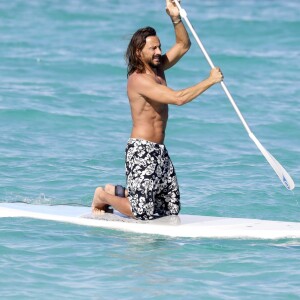 Exclusif - Bob Sinclar et sa femme Ingrid profitent d'une journée ensoleillée sur la plage du Nikki Beach à Saint-Barthélemy, le 9 janvier 2017.