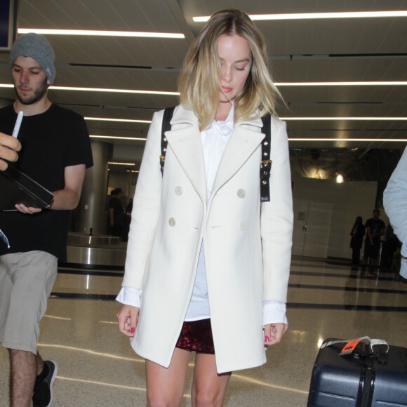 Robbie Margot et son mari Tom Ackerley arrivent à l'aéroport de Los Angeles (LAX), le 26 avril 2017.
