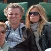 Denis Brogniart et sa femme Hortense assistent au match de Gael Monfils au 2eme Tour des Internationaux de France de tennis de Roland Garros le 29 mai 2013.