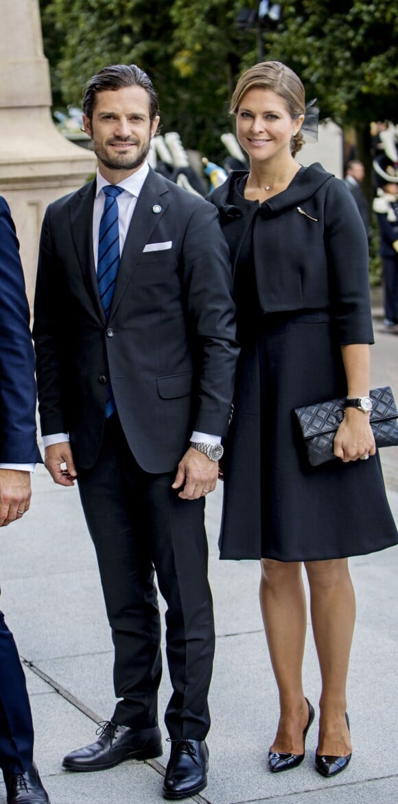 Le prince Carl Philip et la princesse Madeleine de Suède, enceinte, lors de la session d'ouverture du Parlement à Stockholm le 12 septembre 2017.