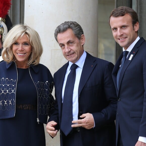 Brigitte Macron, Nicolas Sarkozy et Emmanuel Macron - Les acteurs de la victoire de Paris pour l'organisation des Jeux Olympiques ont été reçus au palais de l'Elysée par le couple présidentiel. Le 15 septembre 2017 © Dominique Jacovides / Bestimage