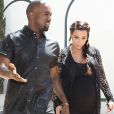 Kanye West et Kim Kardashian à Los Angeles le 10 mai 2013. La star de télé-réalité était enceinte de son premier enfant, North (née en juin de la même année).
