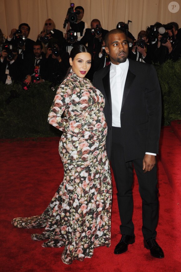 Kim Kardashian et Kanye West au Gala du Met à New York le 6 mai 2013. La star de télé-réalité était enceinte de son premier enfant, North (née en juin de la même année).