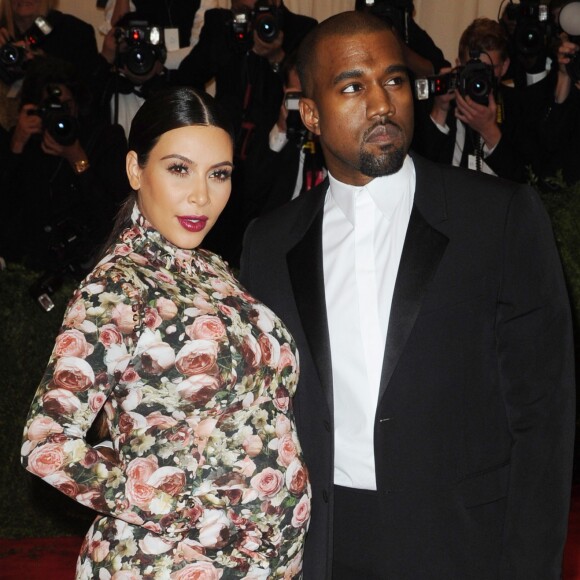 Kim Kardashian et Kanye West au Gala du Met à New York le 6 mai 2013. La star de télé-réalité était enceinte de son premier enfant, North (née en juin de la même année).
