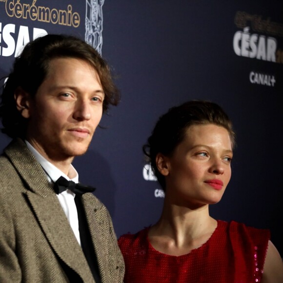 Le chanteur Raphaël et sa compagne Mélanie Thierry (robe Stella McCartney, bracelet Python de la maison Akillis) - Photocall de la 42ème cérémonie des Cesar à la salle Pleyel à Paris, le 24 février 2017. © Dominique Jacovides - Olivier Borde / Bestimage