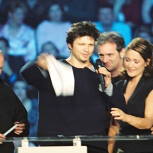 Noir Désir (Serge Teyssot-Gay, Denis Barthe, Bertrand Cantat et Jean-Paul Roy) aux Victoires de la musiques à Paris, le 10 mars 2002.