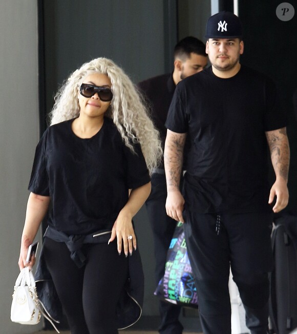 Blac Chyna, enceinte, et son fiancé Rob Kardashian quittent leur hôtel de Miami le 18 mai 2016
