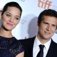 Marion Cotillard, habillée par Dior, et Guillaume Canet lors de la présentation du film Blood Ties au Festival du film international de Toronto le 9 septembre 2013