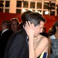 Guillaume Canet et Marion Cotillard lors de la descente des marches du film Blood Ties lors du 66e Festival du film de Cannes, le 20 mai 2013.