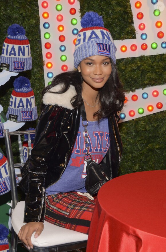 Chanel Iman et son fiancé Sterling Shepard assistent au lancement de la nouvelle collection 'New Era' dans le magasin Macy's Herald Square à New York, le 12 décembre 2017.