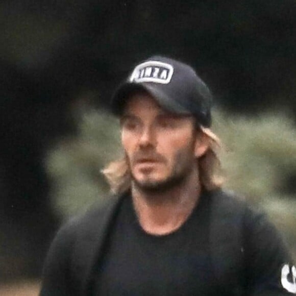 Exclusif - David Beckham et sa femme Victoria se promènent avec leurs enfants Cruz, Romeo et Harper à Pacific Palisades le 23 aout 2017.