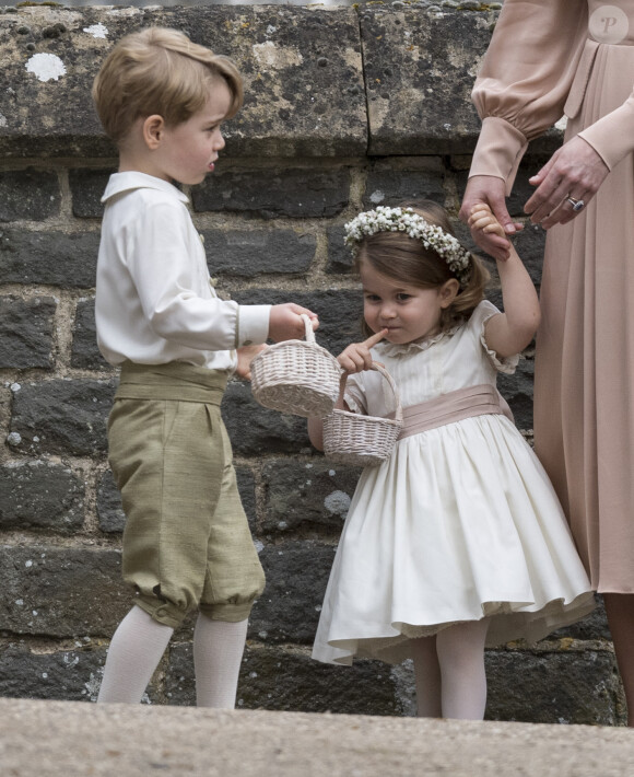 Le prince George et la princesse Charlotte de Cambridge le 20 mai 2017 au mariage de leur tante Pippa Middleton.