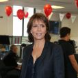 Charity Day BGC 2014 - Carole Rousseau - Courtier d'un jour pour encourager les clients à passer ce jour là le maximum d'ordres dans la salle des marchés d'Aurel BGC Rue Vivienne à Paris. Le 11 septembre 2014.