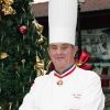 Paul Bocuse devant son restaurant a Collonges-au-Mont-d'Or. Le 2 decembre 2001.