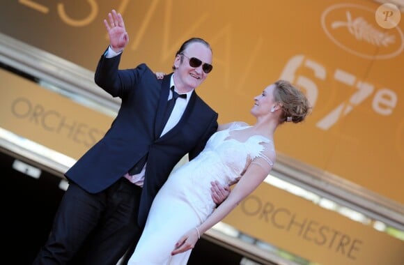 Quentin Tarantino et Uma Thurman - Montée des marches du film "Pour une poignée de dollars" pour la cérémonie de clôture du 67e Festival du film de Cannes – Cannes le 24 mai 2014