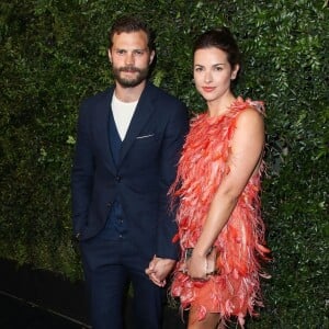 Jamie Dornan et sa femme Amelia Warner lors du dîner "Chanel and Charles Finch Pre-Oscar Awards" au restaurant Madeo à Los Angeles, le 3 mars 2018.