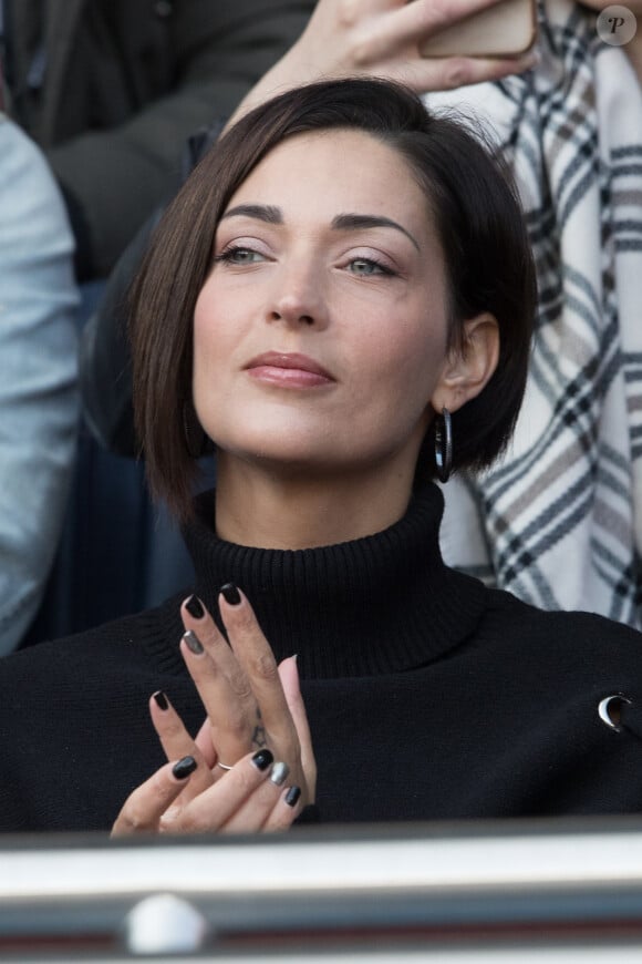 Sheryfa Luna dans les tribunes lors du match de ligue 1 "PSG - Angers (2-0)" au Parc des Princes. Paris, le 14 mars 2018.