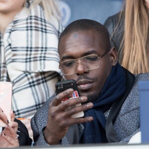 Sheryfa Luna et guest dans les tribunes lors du match de ligue 1 "PSG - Angers (2-0)" au Parc des Princes. Paris, le 14 mars 2018.