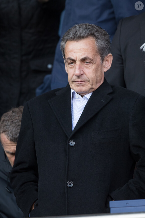 Nicolas Sarkozy dans les tribunes lors du match de ligue 1 "PSG - Angers (2-0)" au Parc des Princes. Paris, le 14 mars 2018.