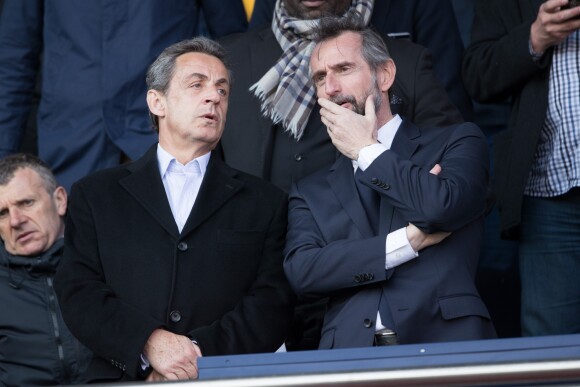 Nicolas Sarkozy et Jean claude Blanc dans les tribunes lors du match de ligue 1 "PSG - Angers (2-0)" au Parc des Princes. Paris, le 14 mars 2018.