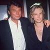 David Hallyday entouré de ses parents, Johnny Hallyday et Sylvie Vartan, le soir de sa première le 9 mars 1991 à Paris.