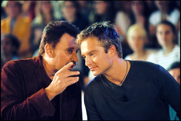 Johnny Hallyday et son fils David Hallyday sur Canal+ à Paris, le 8 septembre 1999.