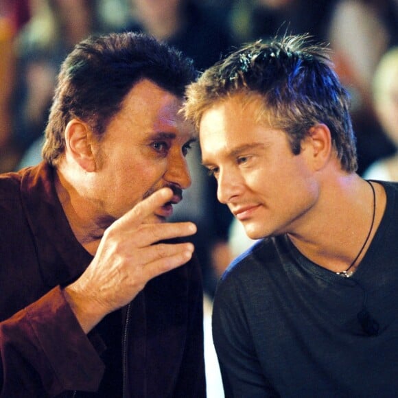 Johnny Hallyday et son fils David Hallyday sur Canal+ à Paris, le 8 septembre 1999.