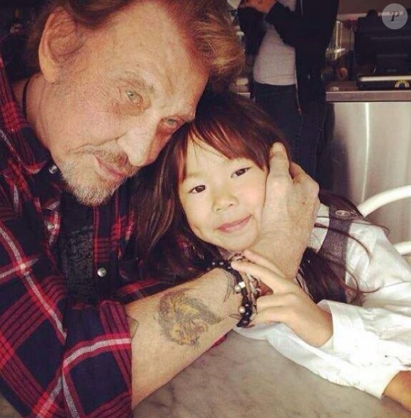 Johnny Hallyday avec sa fille Joy sur Instagram, le 27 juillet 2014.