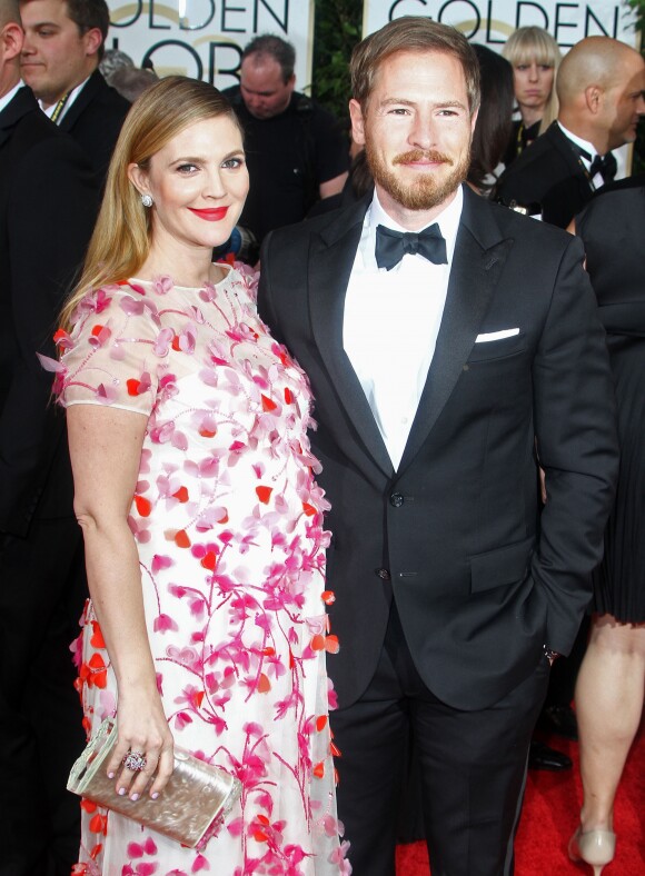 Drew Barrymore enceinte et son mari Will Kopelman - 71eme ceremonie des Golden Globe Awards a Beverly Hills, le 12 janvier 2014.