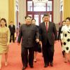 La rencontre du leader nord coréen Kim Jong-un et sa femme Ri Sol-ju avec le president chinois Xi Jinping et sa femme Peng Liyuan le 28 mars 2018.