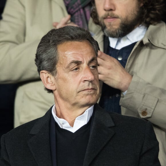 Nicolas Sarkozy dans les tribunes du Parc des Princes lors du match du Paris Saint-Germain (PSG) contre l'En Avant Guingamp (EAG) à Paris, le 29 avril 2018 (score final : 2-2). © Cyril Moreau/Bestimage