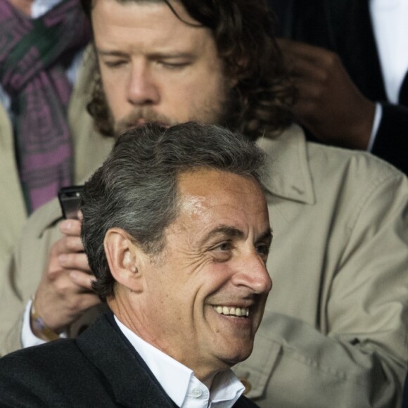 Nicolas Sarkozy dans les tribunes du Parc des Princes lors du match du Paris Saint-Germain (PSG) contre l'En Avant Guingamp (EAG) à Paris, le 29 avril 2018 (score final : 2-2). © Cyril Moreau/Bestimage