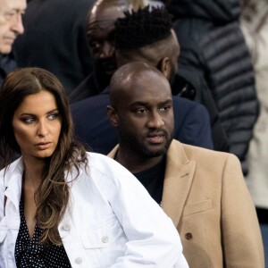 Malika Ménard et, derrière elle, Virgil Abloh dans les tribunes du Parc des Princes lors du match du Paris Saint-Germain (PSG) contre l'En Avant Guingamp (EAG) à Paris, le 29 avril 2018 (score final : 2-2). © Cyril Moreau/Bestimage