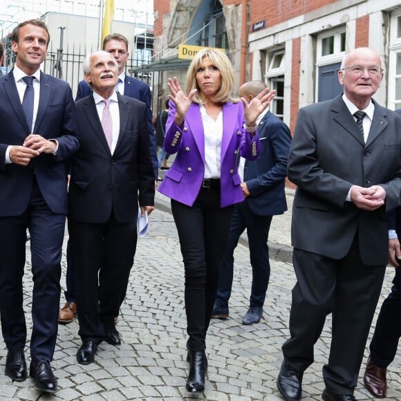 Le Président de la République Emmanuel Macron et la première dame Brigitte Macron (Trogneux) arrivent à la cathédrale d'Aix-la-Chapelle en Allemagne à l'occasion de la remise du prix Charlemagne le 9 mai 2018. © Stéphane Lemouton/Bestimage