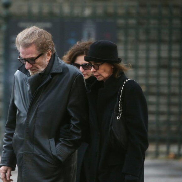 Eddy Mitchell et sa femme Muriel - Sorties de l'église de la Madeleine après les obsèques de Johnny Hallyday à Paris - Le 9 décembre 2017