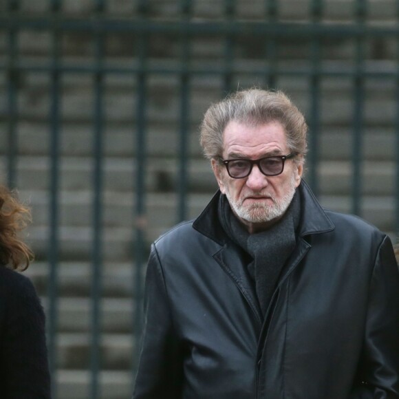 Eddy Mitchell et sa femme Muriel - Sorties de l'église de la Madeleine après les obsèques de Johnny Hallyday à Paris - Le 9 décembre 2017