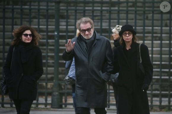 Eddy Mitchell et sa femme Muriel - Sorties de l'église de la Madeleine après les obsèques de Johnny Hallyday à Paris - Le 9 décembre 2017
