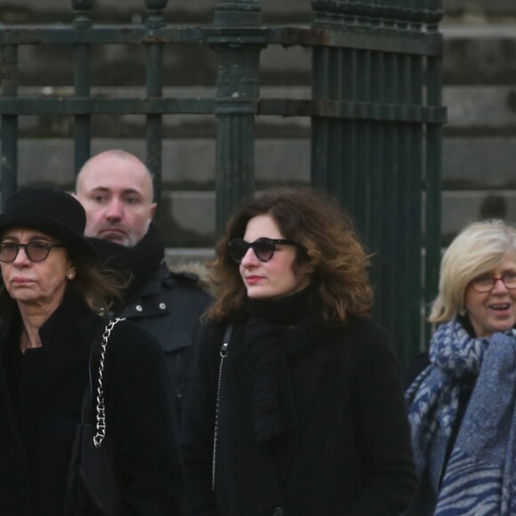 Eddy Mitchell et sa femme Muriel - Sorties de l'église de la Madeleine après les obsèques de Johnny Hallyday à Paris - Le 9 décembre 2017