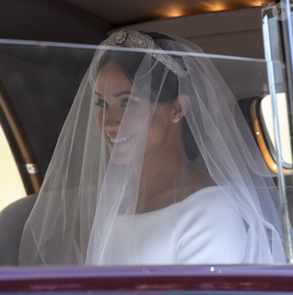 Meghan Markle, duchesse de Sussex arrive à la chapelle St. George au château de Windsor à bord d'une Rolls Royce - Mariage du prince Harry et de Meghan Markle au château de Windsor le 19 mai 2018.
