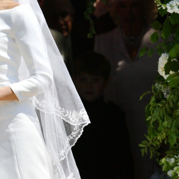 Le prince Harry, duc de Sussex, et Meghan Markle, duchesse de Sussex, à la sortie de chapelle St. George au château de Windsor après la cérémonie de leur mariage, le 19 mai 2018.