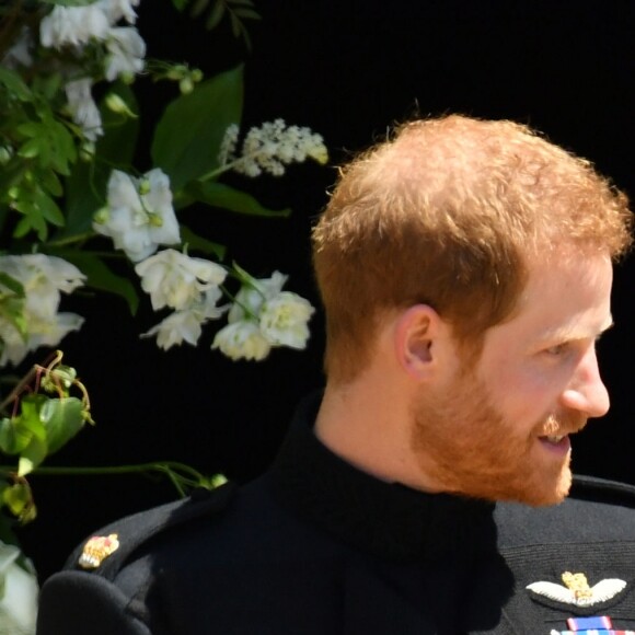 Le prince Harry, duc de Sussex, et Meghan Markle, duchesse de Sussex, à la sortie de chapelle St. George au château de Windsor après la cérémonie de leur mariage, le 19 mai 2018.