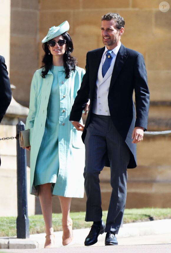 Giada et Alexi Lubomirski, photographe officiel du mariage du prince Harry et de Meghan Markle, arrivant, le 19 mai 2018 à la chapelle St George.