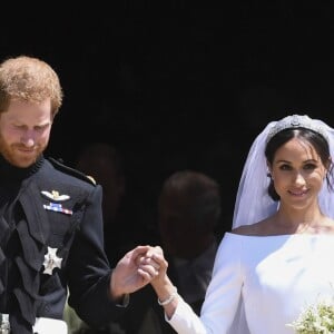 Le prince Harry, duc de Sussex, et Meghan Markle, duchesse de Sussex, à la sortie de chapelle St. George au château de Windsor - Sortie après la cérémonie de mariage du prince Harry et de Meghan Markle en la chapelle Saint-George au château de Windsor, Royaume Uni, le 19 mai 2018.