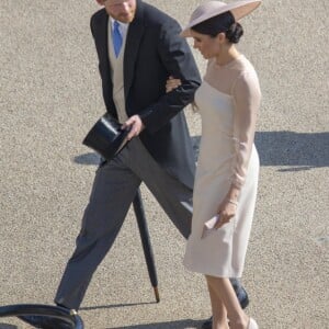 Le prince Harry, duc de Sussex, et Meghan Markle, duchesse de Sussex, à Buckingham Palace le 23 mai 2018 pour une garden party en l'honneur des patronages et associations soutenues par le prince Charles dans le cadre des célébrations de son 70e anniversaire le 14 novembre 2018.