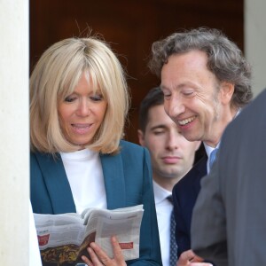 Stéphane Bern, chargé de mission pour le patrimoine et la Première Dame Brigitte Macron (Trogneux) - Le président de la République française et le chargé de mission pour le patrimoine français lancent le Loto "Mission Patrimoine" au palais de l'Elysée à Paris, France, le 31 mai 2018. © Giancarlo Gorassini/Bestimage