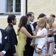 La princesse Sofia de Suède, le prince Carl Philip, le prince Daniel et la princesse Victoria à leur arrivée à l'église au mariage de Louise Gottlieb et Gustav Thott à Hölö au sud de Stockholm le 2 juin 2018.